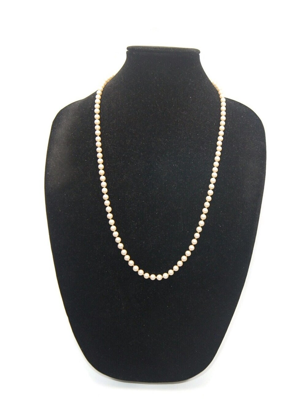 Vintage 29 Inch Individually Knotted Faux Pearl Necklace with Slide Lock Clasp.